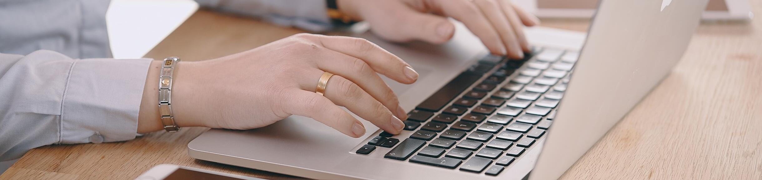 Laptop and hands